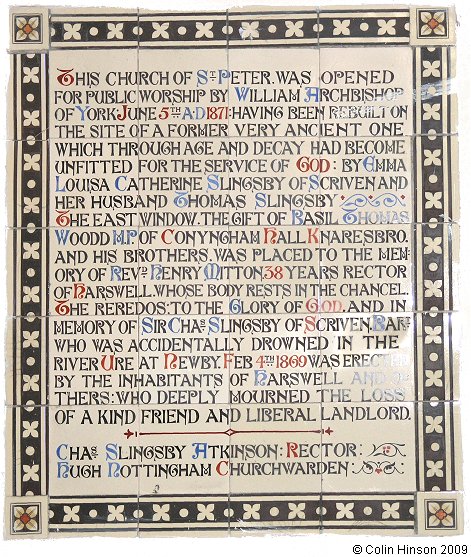 The plaque about re-building of the Church in St. Peter's Church, Harswell.