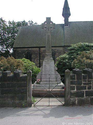 The World War I memorial in the churchyard at Sharlston.